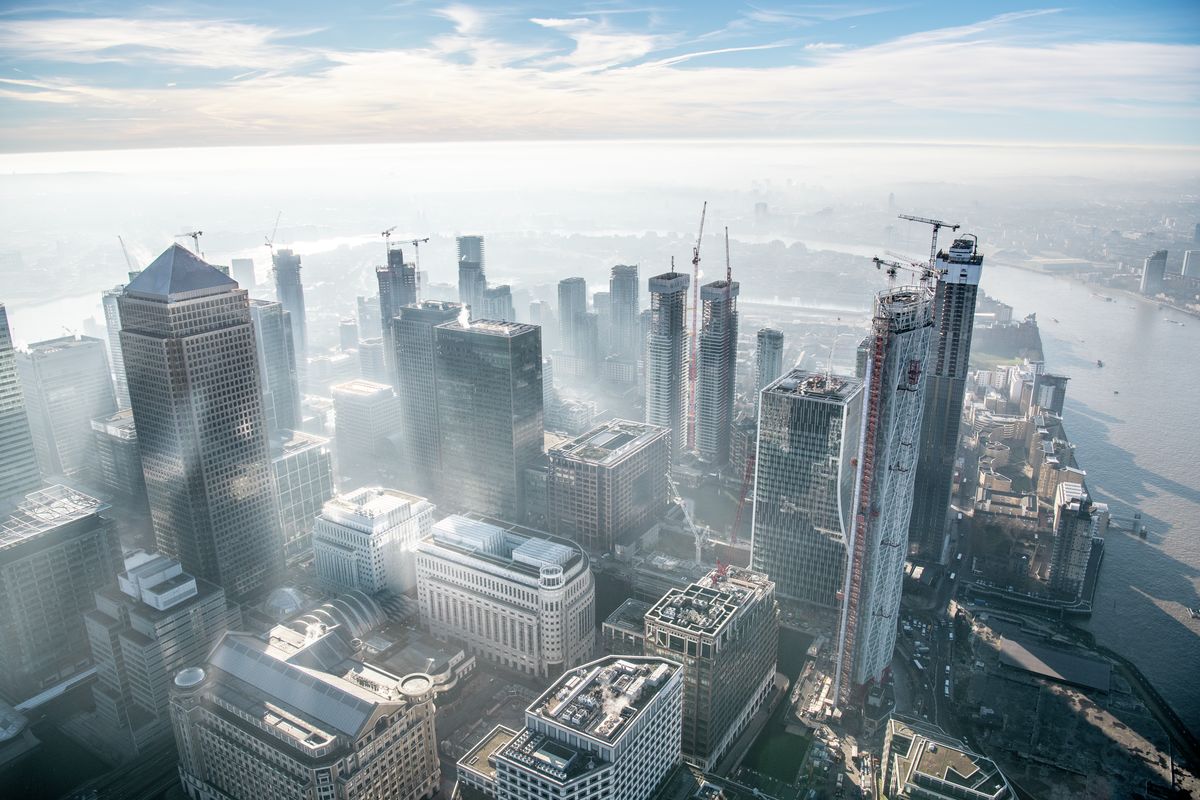 Dawn aerial view of Canary Wharf, Isle of Dogs, London. 322024