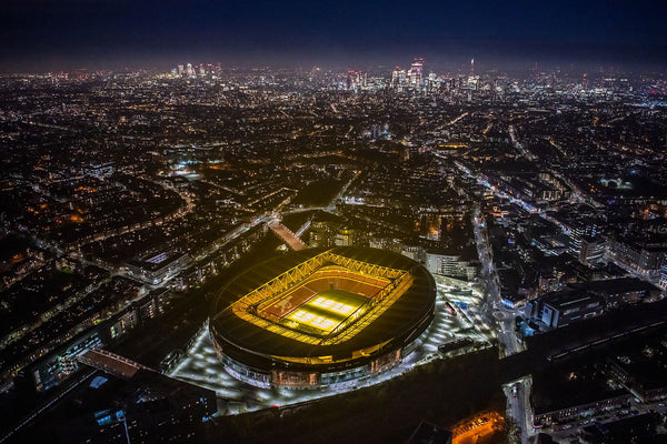 Night Aerial view of Emirates Stadium, London. JasonHawkes-694172